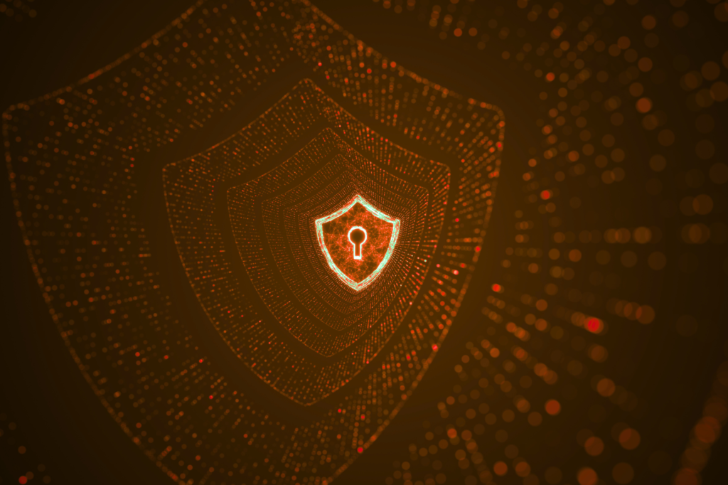 Digital shield with a glowing keyhole symbol at its center, representing cybersecurity and data protection.
