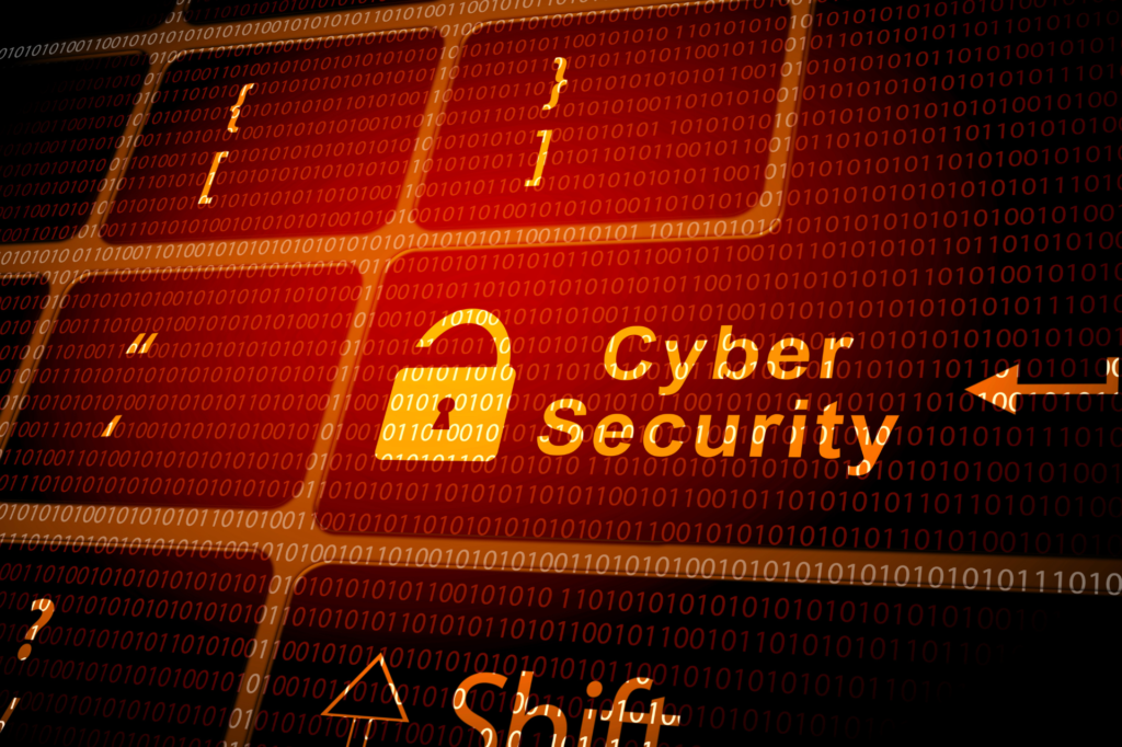 Cybersecurity concept with a glowing padlock icon and the words "Cyber Security" on a red-lit keyboard overlaid with binary code.